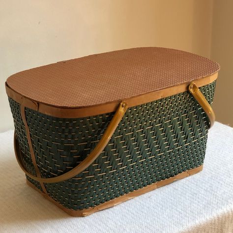 Delightful vintage picnic basket with a lovely forest green exterior weave together with natural earth tones. This basket is in excellent vintage condition being structurally sound and sturdy with metal hinges and handles. Great for storage or displays and also sturdy enough for today's picnic at the park! Fishing Creel Basket Decor, Decorating With Vintage Picnic Baskets, Vintage Picnic Basket Decor, Green Picnic Basket, Picnic Basket Decor, Family Heirloom Display, Vintage Kitchen Gadgets, Spell Cards, Boo Baskets