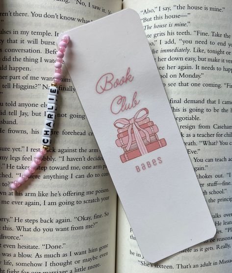 A great personalized gift for yourself or other members in your book club! You can choose from no charm, or an added personalized charm.  All my bookmarks are printed on cardstock paper, cut, and laminated for extra durability! Add the charm for an extra special touch!  Size measures ~2" w x 6"h This personalized charm comes with pink beads. Thank you for the support!  -Libro Lovers! Customized Bookmarks, Book Club Bookmarks, Bead Bookmarks, Pink Bookmark Ideas, Bookmark Personalized, Pink Bookmark, Personalised Bookmarks, Girly Bookmarks, Library Bookmarks