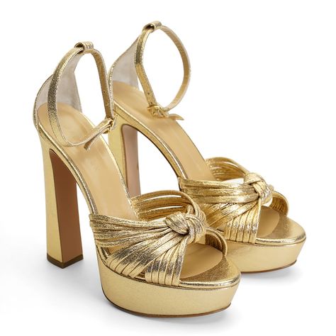 Introducing the Gwen Gold Platform Heel, meticulously crafted in Turkey for elegance and glamour. Adorned with gold glitter piping, these heels add sparkle to any outfit. With a 14cm heel and 4cm platform, they offer both height and stability.   True to size, they ensure a comfortable fit. Made with 100% genuine leather sole and lining, they're durable and stylish. Handmade in Turkey, each pair reflects artisanal craftsmanship. Elevate your look with the Gwen Gold Platform Heel, perfect for any occasion. Use a soft, damp cloth to clean stains, dust, or dirt. Avoid direct sunlight exposure and keep away from humid environments. When not in use, store items in a box or a protective dust bag in a cool, dry place. Made in Turkey Gold Platform Heels, Nail Bags, Special Gifts For Him, Gold Platforms, April Birthstone Jewelry, Led Fashion, March Birthstone Jewelry, Forever Jewelry, Gifts For New Mums