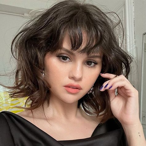 The Biggest Winter Haircut Trends Of 2023 - Behindthechair.com Selena Gomez Hair, Bangs For Round Face, Wispy Bangs, Trending Haircuts, Short Hair With Bangs, Celebrity Hairstyles, Layered Haircuts, Round Face, Hairstyles With Bangs