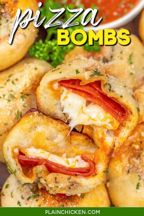 Pizza Bombs Recipe -  pizza dough squares, loaded with pizza sauce, pepperoni, and gooey mozzarella cheese cubes. Baked to golden perfection in a muffin pan, they're then brushed with garlic butter and sprinkled with Parmesan cheese. Bursting with flavor in every bite, they're the ultimate snack or appetizer for pizza lovers. Pizza Bomb, Pizza Buffet, Leftover Pizza, Pizza Sauce Homemade, Bombe Recipe, Plain Chicken, Homemade Pizza Dough, Pasta Salad Italian, Pizza Bites