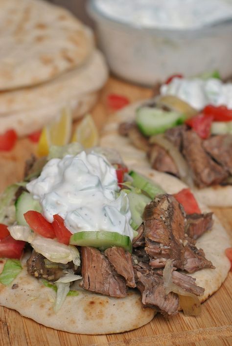 Slow Cooker Beef Gyros via @preventionrd Steak Gyros, Crockpot Sandwiches, Beef Gyros, Dips And Chips, Beef Gyro, Steak And Onions, Tzatziki Recipes, Mediterranean Diet Recipes Dinners, Pita Sandwiches