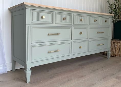 I just realized I never posted pictures of this beautiful dresser I finished a while ago! This colour is an absolute favourite of mine- such a light, soft and serene shade of sage ish green without much grey tones. Paired with a lighter toned top and modern handles, I love how it turned out! Paint- Bellwood @fusionmineralpaint Hardware- @amazonca Polewrap- Home Depot Online @homedepotcanada •NOT AVAILABLE • If you wish to purchase something like this, plsend us a message. I have a dress... Evergreen Fog Dresser, Sage Green Dresser, Sage Green Furniture, White Nursery Furniture, Grey Painted Furniture, Green Dresser, Refinish Furniture, Grey Dresser, Refinishing Furniture Diy