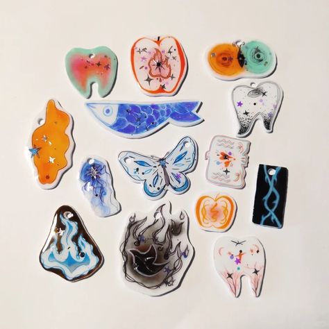 Angel's Wings Shrink Plastic Ring | Jewelry | Three Fleas Shrinking Plastic Diy, Shrink Paper Ideas, Shrinks Dink Ideas, Shrink Plastic Ring, Plastic Rings Jewelry, Shrink Plastic Keychain, Shrink Plastic Ideas, Shrink Plastic Charms, Shrinky Dink Charms