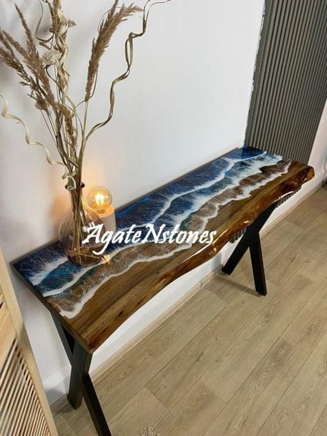 This is a Epoxy Resin Gaming or Trading Desk made with Walnut which is beautified with colored pigment . The resin river table is brand new and the contemporary design would be a unique addition to your home. With its perfect combination of style and function this piece of furniture is sure to be the star of any room. This modern table will also make for an awesome gift for your friends or relatives. Each one is created with high quality resin and individually handcrafted. Resin is a highly refl Live Edge Console Table, Resin Arts, Resin Table Top, Epoxy Wood Table, Epoxy Table Top, Custom Consoles, Ocean Resin, Epoxy Resin Table, Epoxy Table