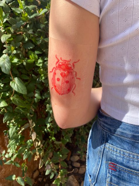 Red Ink Ladybug Tattoo, Ladybug Arm Tattoo, Unique Ladybug Tattoo, Cowboy Possum Tattoo, Color Bug Tattoo, Red Ladybug Tattoo, Cute Grunge Tattoos, Ladybug Tattoo Traditional, Matching Bug Tattoos