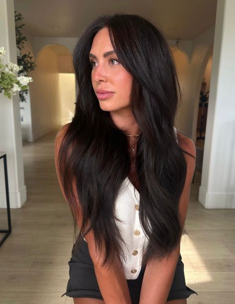 We love a rich and moody brunette 🖤 Reminder: It's time to restock your darker extension collection before the fall season hits! New Here? Head to our link in bio to start the approval process to shop our website! Hair by @ellestyledmyhair #hairextensions #weftextension #HairStylist #hairextensionscolors #wefthairextensions #extensionsspecialist #scottieandashton #Darkshades #darkshades Darkest Brunette Hair, Long Black Brown Hair, Dark Brunette Hair Extensions, Dark Deep Brown Hair, Dark Brown To Black Hair, Madi Prewett Hair, Dark Almost Black Hair, Rich Dark Brown Hair Color Balayage, Dark Espresso Brown Hair