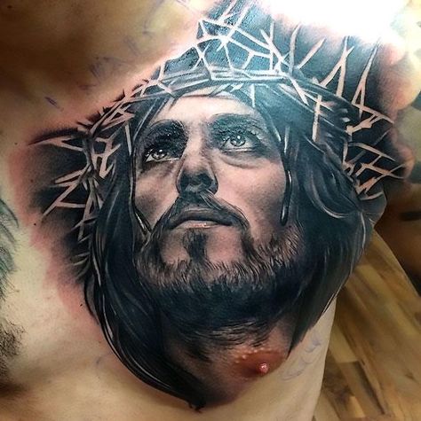 A tattoo of the face of Jesus. It's done very well in black and gray style. Style: Black and Gray. Color: Black. Tags: Beautiful Jesus Chest Tattoo, Christus Tattoo, Jesus Christ Tattoo, Tato Salib, Jesus Tattoo Design, Tato Dada, Christ Tattoo, Free Tattoo Designs, Tattoo Trend