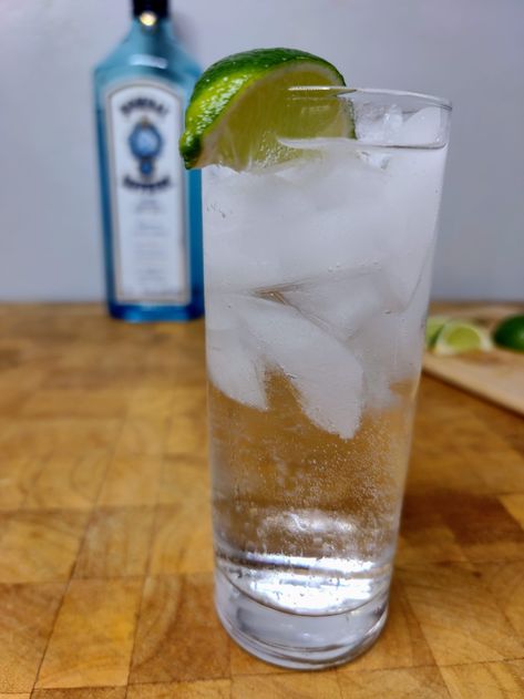 Gin and Soda: the almost Rickey | Occasional Cocktails Gin And Soda, Gin Tasting, Low Calorie Drinks, Two Ingredient, Seltzer Water, Lime Peel, Bar Spoon, Soda Water, Carbonated Water