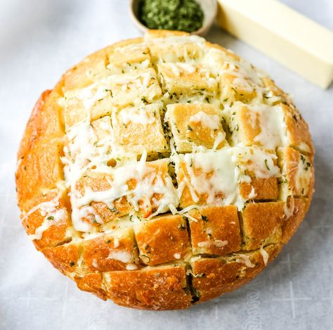 Cheesy Pull-Apart Garlic Bread Warm sourdough bread baked with garlic butter, melted mozzarella cheese, and spices. The best pull-apart garlic cheese bread! www.modernhoney.com #garlicbread #cheesebread #garliccheesebread Pull Apart Garlic Bread, Cheesy Pull Apart Bread, Modern Honey, Buttery Sugar Cookies, Homemade Garlic Butter, Cheese Bread Recipe, Lasagna Soup Recipe, Garlic Cheese Bread, Garlic Bread Recipe