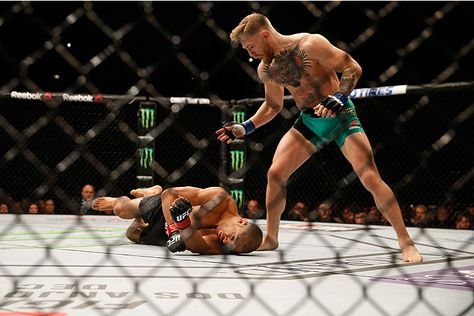 LAS VEGAS, NV - DECEMBER 12:  (R-L) Conor McGregor of Ireland punches Jose Aldo of Brazil in their UFC featherweight championship bout during the UFC 194 event inside MGM Grand Garden Arena on December 12, 2015 in Las Vegas, Nevada.  (Photo by Christian Petersen/Zuffa LLC/Zuffa LLC via Getty Images) *** Local Caption *** Jose Aldo; Conor McGregor Martial Arts, Dublin, Ufc, Jose Aldo, Notorious Conor Mcgregor, Mma Videos, Connor Mcgregor, Conor Mcgregor, Mixed Martial Arts