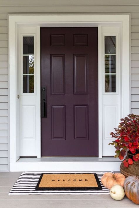 When we bought our new build house back in 2017, there were a lot of paint color decisions to make all at once, and I wasn’t really prepared to make them.When asked what color I wanted for the front door, I was like, “Um, black, I guess?”Because you can never go wrong with black!But over the years, I started feeling like I was missing a big style opportunity. Sure, the black was classic and elegant, but you want your front door to make a statement, you know?So, now that my front door i… Purple Garage Door, Grey House Purple Door, Dark Plum Front Door, Purple Front Door Paint Colors, Deep Purple Front Door, Eggplant Front Door Color, Purple Doors Front House, Plum Front Door, Purple Front Door Colors