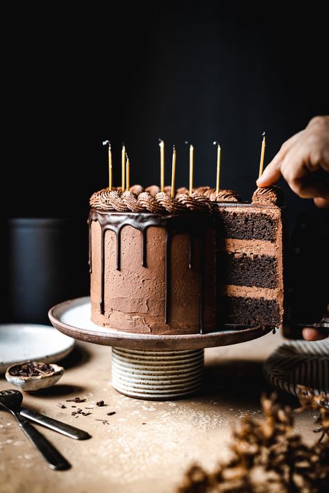 This rich tripe chocolate drip cake has three layers of dense and fudgy chocolate cake. It's filled and covered with a smooth dark chocolate buttercream, and topped with a dramatic ganache chocolate drip. It's crowned with a decorative buttercream rope border for a simple and elegant design worthy of any special occasion. Three Layer Chocolate Cake, Chocolate Ganache Drip Cake, Dark Chocolate Buttercream, Marzipan Cake, Triple Chocolate Cake, Chocolate Cake Designs, Ganache Cake, Chocolate Drip Cake, Rope Border