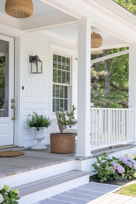 Transform Your Porch: 12 Coastal Design Tips for a Summer Oasis - Casually Coastal Hampton Style Verandahs, White House With Hydrangeas, Porch Colors For White House, Front Porch Beach House, Cape Cod Front Porch Ideas, Front Porch White House, White House Front Porch, White House With Porch, Nantucket House Exterior