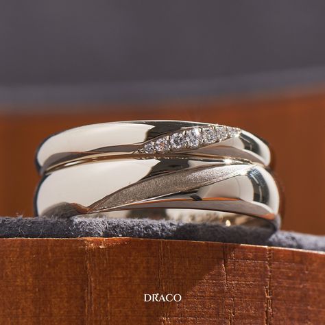 A timeless pair of wedding bands. ⁠ For the lady's ring, we added a row of diamonds that seamlessly follows the ring's contour—giving it a more feminine look to it.⁠ ⁠ While the gent's ring is crafted in full 18K champagne gold with a broader band. Dating Rings, Alliance Ring, Hand Jewelry Rings, Unusual Wedding Rings, Sherwani For Men Wedding, How To Tie Shoes, Couple Ring Design, Couples Wedding Bands, Couple Band