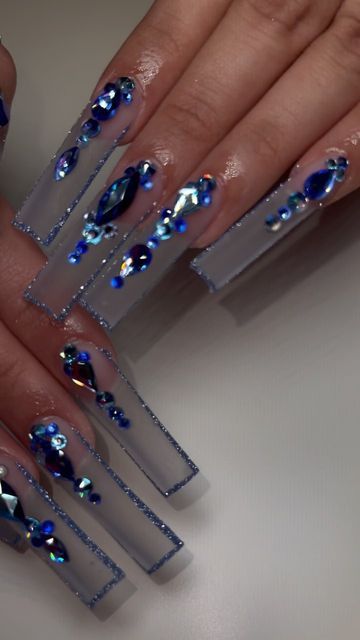 Blue Tapered Square Nails Long, Clear And Blue Nails, Blue N Black Nails, Blue Clear Nails, Blue And Silver Prom Nails, Blue Gem Nails, Dark Blue And Black Nails, Clear Blue Nails, Houston Nails