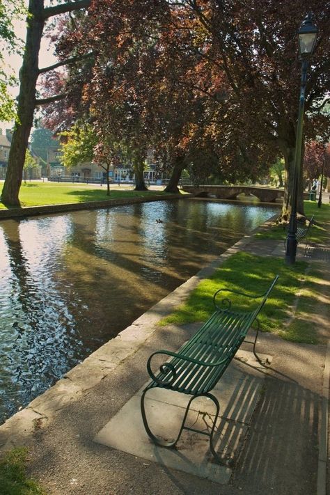 Gloucestershire England, Bench Area, Bourton On The Water, Park Benches, Cotswolds England, Places In England, The Cotswolds, Village Life, Urban Spaces