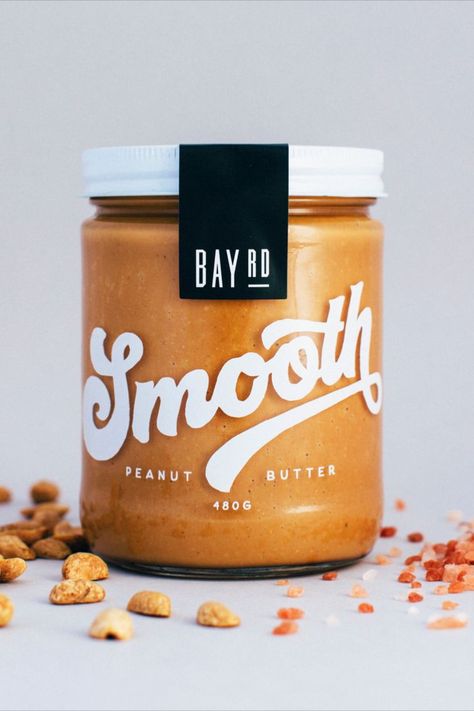 Creative peanut butter packaging with gorgeous typography Nut Butter Packaging Design, Nut Butter Branding, Peanut Butter Branding Design, Nut Butter Packaging, Peanut Butter Branding, Food Jar Packaging, Peanut Butter Label Design, Spreads Packaging, Butter Logo Design