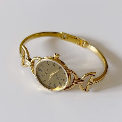 SOLD** Gucci Round Gold Plated Bangle Watch from the 90s will be available today at 5pm pacific time! Bangle Watches Women, Gold Bangle Watch, Pretty Watches, Ladies Bracelet Watch, Simple Watches, Graduation Jewelry, Watches Collection, Ladies Bracelet, Gold Watches Women