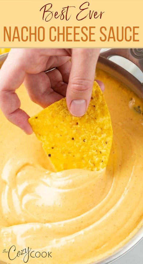 A hand dipping a tortilla chip into a skillet of Nacho Cheese sauce. Nachos With Nacho Cheese Sauce, Easy Recipes With Velveeta Cheese, Cheese Sauce For Nachos Without Velveeta, Fiesta Nacho Cheese Soup Dip, Cheese Sauce With Velveeta Recipe, Best Nacho Dip Recipes, Nacho Cheese Sauce Instant Pot, Crockpot Nachos Cheese, Nacho Cheese Sauce Velveeta Rotel