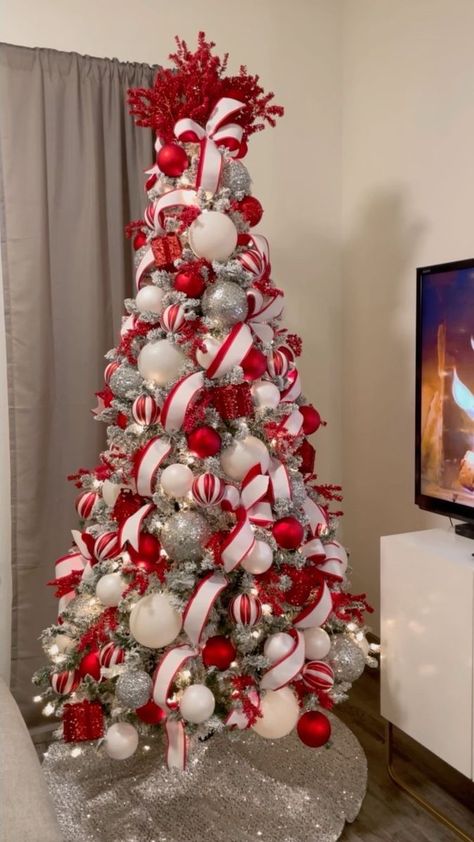 Classic Christmas. You can never go wrong with a red, white, and silver color scheme. ❤️🤍🩶 . . . . . . #classicchristmas #christmastreedesigner #christmastree #christmastreeinspo #absholidaydecor #hobbylobby #athome #christmascountdown #christmasiscoming #fypシ #explorepage #reelsinstagram #cozychristmas #noel #navidad #christmasdecor #christmasaddict #christmasmood #tistheseason #winterholiday #holidayseason | AB's Holiday Decor | Auni · Twinkling Lights (Reimagined) Natal, Red And White And Silver Christmas Tree, White Red And Silver Christmas Decor, Red White Silver Christmas Tree Ideas, Red And White Ribbon Christmas Tree, White Tree With Red Decorations, Red Snd White Christmas Tree, Red And White Ornaments Christmas Tree, Red White And Silver Christmas Tree Decorating Ideas