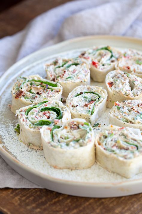 Vegan Tortilla Roll Ups Recipe. Veggies and Sun-dried tomato are mixed in Tofu Herb Cream Cheese androlled to make Easy Tortilla pinwheels. Vegan Nutfree Recipe, can be gluten-free soy-free #Vegan#veganricha #tortillarollups #sundriedtotmatopinwheels Southwest Roll Ups Flour Tortillas, Green Tortilla Pinwheels, Chicken Appiterzers For Party, Nutrition Day, Tofu Cream Cheese, Vegan Tortilla, Chicken Pinwheels, Tortilla Pinwheels, Tortilla Rolls