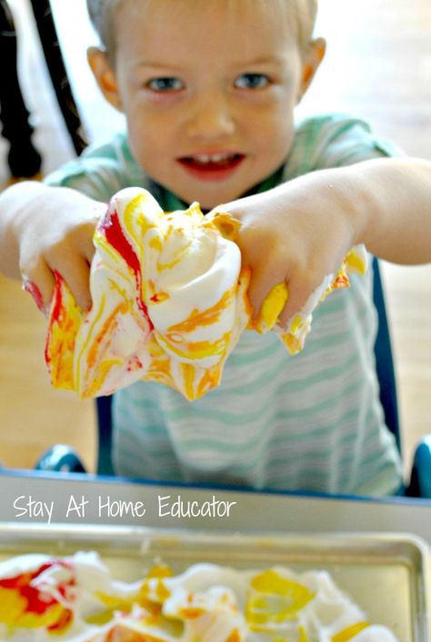 Making art with shaving cream and paint, part of exploring the sense of touch in five senses theme - Stay At Home Educator Sense Of Touch Activities, Touch Activities, 5 Senses Craft, Five Senses Preschool, 5 Senses Activities, Sensory Activities For Preschoolers, Senses Preschool, Body Preschool, Toddler Board