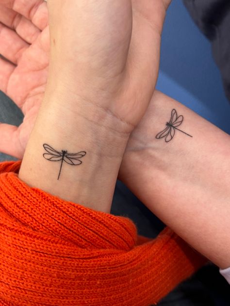 dragonfly tattoo, matching tattoos, friendship tattoos, fine line tattoo, thin tattoo, simple tattoo, minimalist tattoo Matching Dragon Fly Tattoo, Dragonfly Tattoo Matching, Mini Dragon Fly Tattoo, Small Dragonfly Tattoo Placement, Dragonfly Inn Tattoo, Dragonfly Moon Tattoo, Simple Dragonfly Tattoo Design, Mini Dragonfly Tattoo, Dragonfly Matching Tattoos