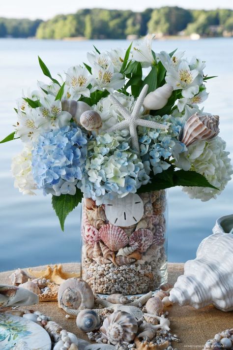 Seashells In Glass Containers, Coastal Flower Arrangements, Coastal Floral Arrangements, Beach Flower Arrangements, Flowers For Beach Wedding, 222 Design, Nautical Flowers, Coastal Centerpiece Ideas, Beach Wedding Centerpieces Flowers