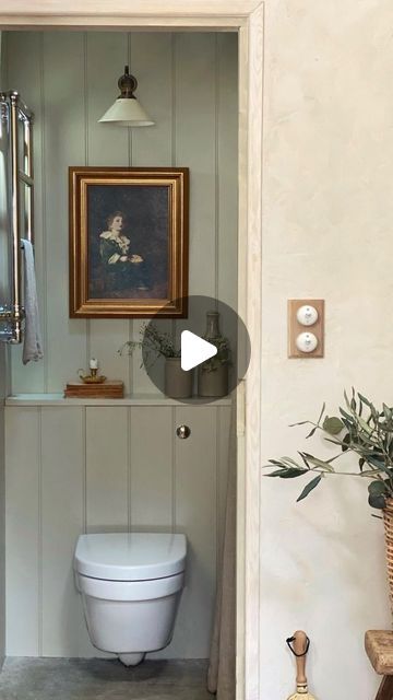 Steph Gowla on Instagram: "A little walk through of our tiny downstairs bathroom 🌿 I’m so glad we pinched some space from the utility room to create this as it’s been so useful. It’s amazing what you can squeeze into a small space, I’ve listed all the sources below 😊 #smallspaces #smallbathroom #charminghomes

Shower Tiles - ‘Zellige Pearl’ @porcelainsuperstore 
Curtain - ‘Lara pencil pleat’ @linenme *
Panelling - @mkm.buildingsupplies *
Wall light - @devolkitchens 
Stone Flooring ‘Sahara Sandstone’ @mkm.buildingsupplies 
Art ‘Bubbles’ print - Antiques Shop 
Loo roll holder - @etsyuk 
Towel warmer - Heritage Portland 474mm
Toilet - @villeroyboch Architectura Compact rimless wall hung 
Door - @xljoinery *
Basin taps - reclaimed @ebay_uk
Basin waste - @bespoketaps 
Rim lock @fromtheanvil Panelling Downstairs Loo, Wall Hung Toilet Ideas, Steph Gowla, Small Cloakroom Ideas, Compact Shower Room, Tiles Zellige, Tiny Shower Room, Art Bubbles, Loo Roll Holders