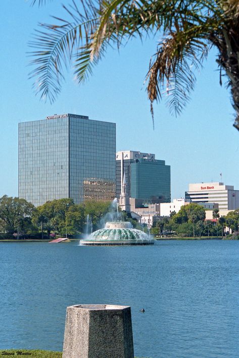 https://flic.kr/p/2ncY92w | Lake Eola, Orlando, 1986 | View of a couple of the few high-rises that existed at the time as well as the fountain in the lake. Lake Eola Orlando, Lake Eola, Downtown Orlando, The Fountain, Central Florida, Vintage Photo, Marina Bay Sands, Vintage Photos, Orlando