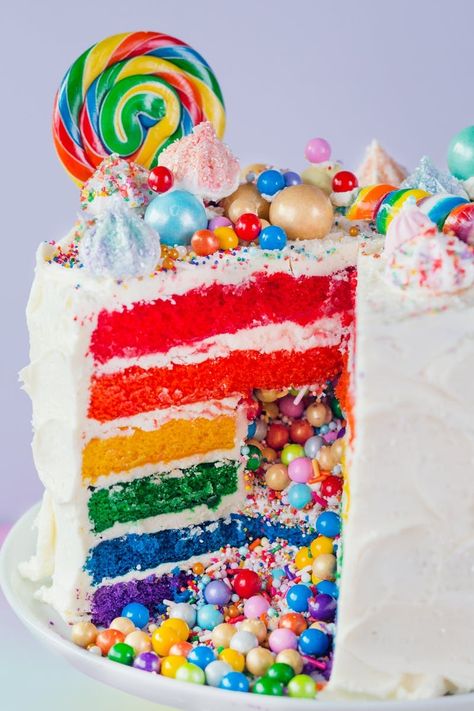 How To Make the Ultimate Rainbow Surprise Cake. Maybe you've seen cakes like this on Pinterest, your favorite baker's Instagram feed, or even IRL at your best friend's house and thought to yourself, "That cake looks so fun and complicated; I could never make that." I'm here to encourage you otherwise! You can totally make this knock-out, show-stopping surprise-inside rainbow layer cake from scratch. Piniata Cake, Swirl Cakes, Surprise Inside Cake, Rainbow Cake Recipe, Rainbow Layer Cakes, Cake Flavours, Nursing Cake, Inside Cake, Rainbow Cakes