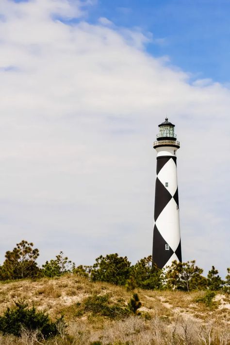 black and white diamond pattern cape lookout lighthouse against a blue sky Cape Lookout Lighthouse, Black And White Diamond Pattern, Beaufort Nc, North Carolina Coast, Atlantic Beach, Maritime Museum, Got To Be, Emerald Isle, National Forest