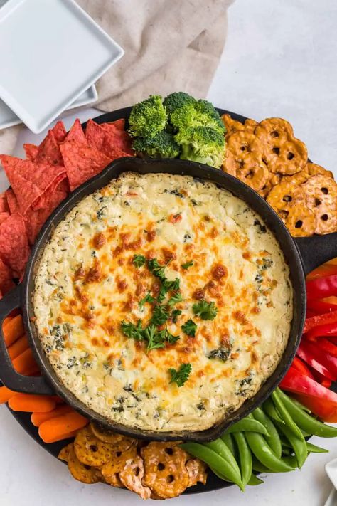 Cheesy Baked Spinach Dip Recipe 1 Creamy Cheesy Spinach Dip, Hot Spinach Dip Recipe, Cheesy Spinach Dip, Slow Cooker Dip Recipes, Party Food Favorites, Baked Spinach Dip, Slow Cooker Dips, Hot Spinach Dip, Creamy Spinach Dip