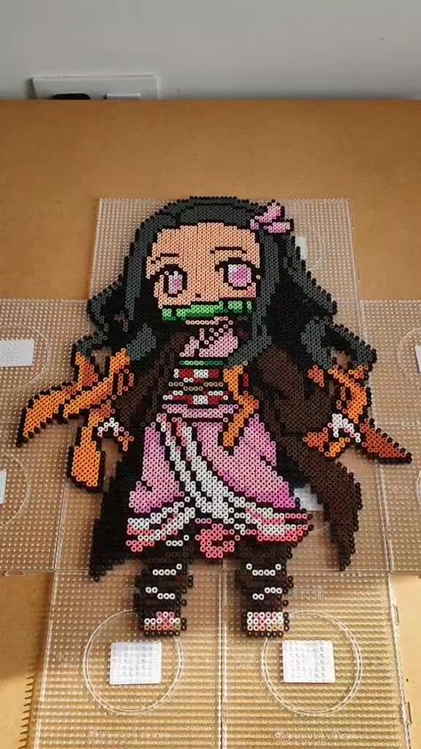 Nezuko Perler Bead Patterns, Demon Slayer Pearl Beads, Perler Demon Slayer, Perler Bead Patterns Characters, Hama Beads Patterns Anime, Anime Pearler Beads Patterns, Nezuko Perler Beads, Demon Slayer Perler Bead Patterns, Demon Slayer Perler Beads