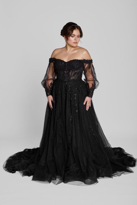 Black wedding dresses make a bold and beautiful statement, offering an unforgettable twist on traditional bridal fashion. For the bride who dares to embrace her individuality, these gowns blend timeless elegance with a touch of mystery. From intricate lace details to dramatic silhouettes, this guide explores the allure of black wedding dresses that cater to diverse styles and body types. | black wedding dresses | unique wedding dresses | #wedding #bride #dress Romantic Black Wedding Dress, Pretty Black Wedding Dresses, Black Wedding Dresses Plus Size Gothic, Black Wedding Dress Curvy, Black Wedding Veil With Crown, Black Off The Shoulder Wedding Dress, Gothic Bride Aesthetic, Black Wedding Dresses Long Sleeve, Black Fairytale Wedding Dress