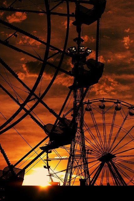 Sunset at the carnival. My favorite place. The smells of the food, the sounds of the midway and the chill of the cool fall air rushing over me as I spin in my gondola. I can't wait for Emma to get big enough to ride on them with me.  That is happiness for me. Rocket Pop, Silhouette Photography, Sun Setting, Orange Sky, Sky Sunset, Ansel Adams, Foto Art, Amusement Park, Beautiful Sunset