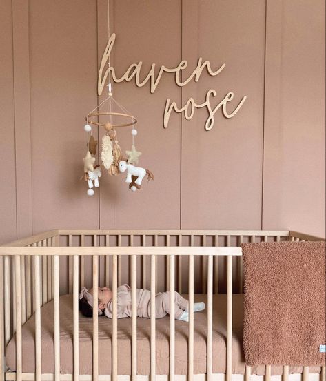 Accent Wall Baby Girl Nursery, Nursery Ideas With Name On Wall, Maybe Pink Nursery, Modern Pink Nursery, Nursery Crib Wall Decor, Female Nursery Ideas, Dusty Pink Boho Nursery, Nursery Accent Wall With Name, Neutral And Pink Nursery