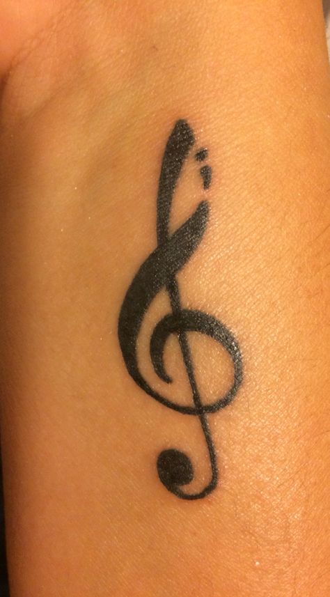 Finally got my semi colon treble clef tattoo! Love it!  G Clef, music, semi con project tattoos. Clef Tattoo, Notes Tattoo, Semicolon Tattoos, Treble Clef Tattoo, Colon Tattoo, Tattoo Removal Cost, Semicolon Project, Semi Colon, Arm Tats