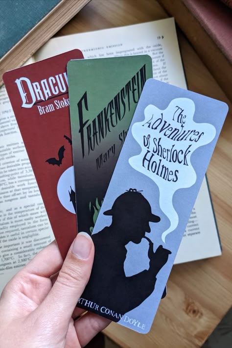 This set of three classic book bookmarks is the perfect gift for any book lover or bookworm! With three designs based off Dracula, Sherlock Holmes and Frankenstein, each bookmark has the beginning of the opening chapter printed on the reverse. All bookmarks are printed onto waterproof 300gsm paper and hand made by me in my little studio. Book Bookmarks, Book Bookmark, Cool Bookmarks, Library Inspiration, Creative Bookmarks, Paper Bookmarks, Gift Box Design, Harry Potter Pictures, Classic Book