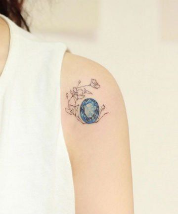 Family Birthstones, 21 Gemstone Tattoos So Pretty You Won't Need Jewelry Anymore - (Page 7) Gem Flower Tattoo, Sapphire Tattoo Design, Gemstone Tattoo Ideas, Crystal Flower Tattoo, Gemstone Tattoos, Birthstone Tattoo Ideas, Sapphire Tattoo, Cosmo Tattoo, Gemstone Tattoo