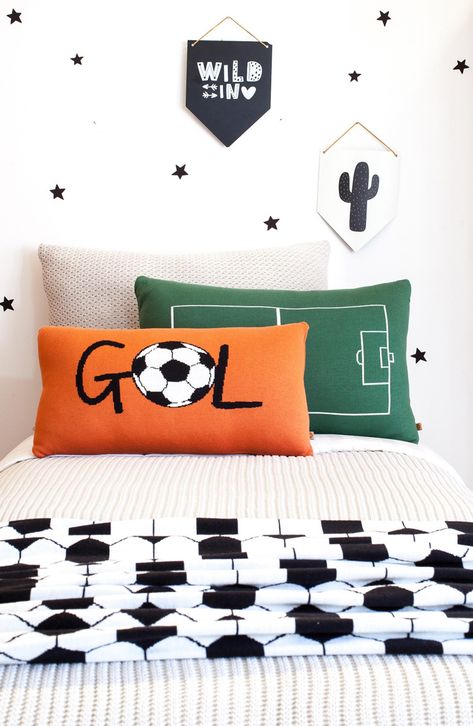 Your young soccer fan will dream of making a game-winning 'gol' for Real Madrid or another favorite team with this soft throw pillow providing inspiration. Suitable from birth 12" x 24" 50% cotton, 50% nylon Spot clean Made in Brazil Soccer Bedroom Ideas For Boys, Soccer Inspired Bedroom, Soccer Bedroom For Boys, Soccer Theme Rooms For Boys, Teen Boy Soccer Bedroom, Soccer Bedroom Ideas, Kids Sports Bedroom, Soccer Bedroom Decor, Boys Soccer Bedroom