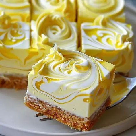 Elegant Lemon Marbled Cheesecake Bars Recipe - optimal recipes Marbled Cheesecake, Lemon Cheesecake Bars, Dessert Oreo, Cheesecake Bar Recipes, Boston Cream, Lemon Cheesecake, Lemon Desserts, Cheesecake Bars, Lemon Recipes