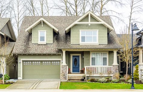 Green garage door green painted house Green Garage Door, Green House Color, Door Color Ideas, Sage Green House, Exterior Garage Door, Exterior Front Door Colors, Green Exterior House Colors, Green Garage, Green House Exterior