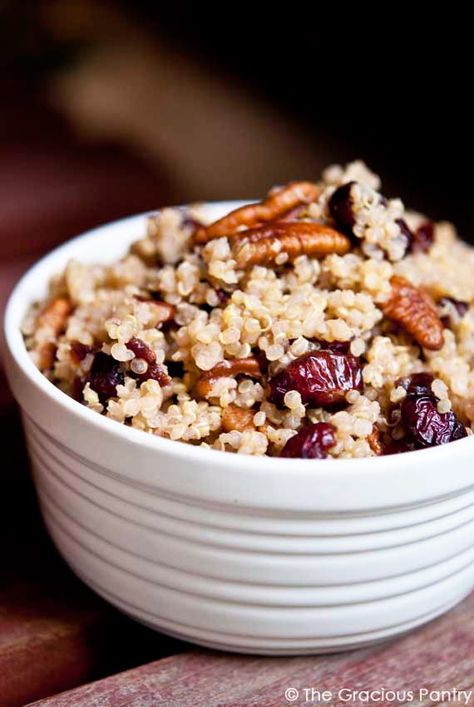 4 cups cooked quinoa, cooked with unsweetened almond milk, cooled* 1 cup juice sweetened, dried cranberries 1 cup pecan pieces 1/2 tsp. cinnamon 2 tbsp. honey 4 tbsp. fresh lemon juice Quinoa Recipes, How To Cook Quinoa, Dried Cranberries, Clean Recipes, Clean Eating Recipes, Sans Gluten, A Bowl, Quinoa, Real Food Recipes