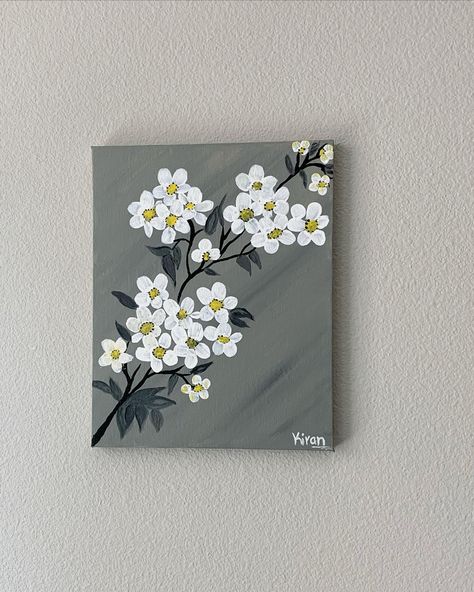 white flower with stem with smear of grey in background brings out beautiful look on this acrylic painting on canvas. Acrylic Paintings Floral, Painting On Grey Background, White Flower Canvas Painting, Simple Floral Paintings On Canvas, White Painting Ideas On Canvas, Simple Art Painting Ideas Beautiful, Flower Easy Painting Simple, Simple Canvas Art Painting, Small Acrylic Canvas Paintings