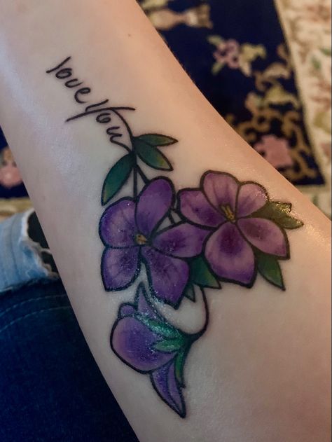 African Violet Tattoo, Violet Tattoos, Violet Flower Tattoo, Cross Stitch Tattoo, Violet Tattoo, Kiss Tattoos, Tattoo Concepts, Flower Wrist Tattoos, Tattoo Forearm