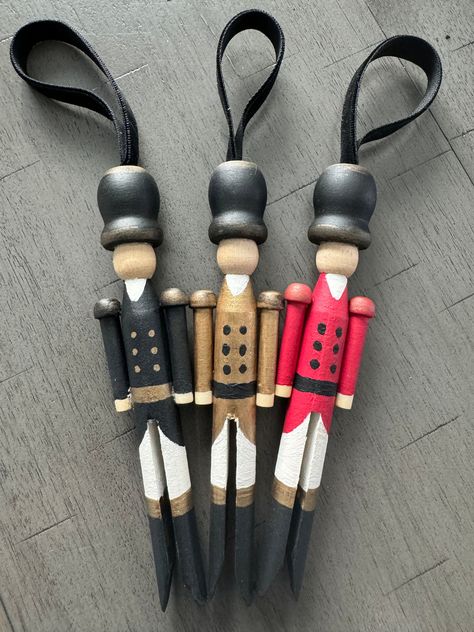 Wooden Soldier Ornament – Bohemian Bee Old Clothespin Crafts Christmas, Old Clothes Pins Ideas, Dough Art Ornaments, Clothespin Nutcracker Ornaments, Old Clothes Pin Crafts, Wood Clothes Pin Crafts, Clothespin People Ornaments, Christmas Pins Diy Craft Ideas, Christmas Clothes Pin Crafts