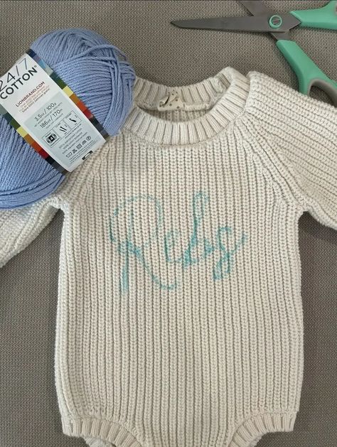 How To DIY a Hand Embroidered Name Sweater • Emily Rone Home Crochet Name On Sweater Diy, Diy Personalized Sweater, How To Embroider Clothes By Hand, Embroidered Sweater Kids, Diy Hand Embroidered Sweater, Name On Sweater Diy, Diy Embroidered Shirt Ideas, Embroidered Names Hand Embroidery, Baby Sweater Embroidery Name Diy