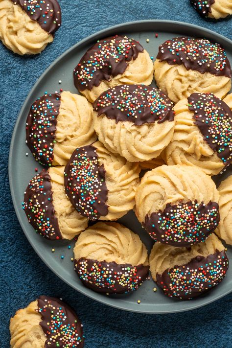 These vegan butter cookies are a classic holiday cookie, but you'll love them so much you'll make them year-round. They are soft and buttery and melt-in-your-mouth! | lovingitvegan.com Vegan Soft Cookies, Vegan Butter Cookies, Vegan Butterscotch Cookies, Vegan Butter Cookies Recipe, Vegan Danish Butter Cookies, Easy Vegan Holiday Cookies, Vegan Brown Butter Cookies, Oatmeal Shortbread, Chocolate Chip Peanut Butter Oatmeal